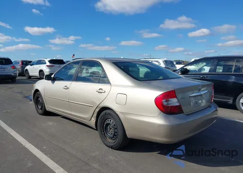 2004 Toyota Camry Le z USA, uszkodzony, nr VIN 4T1BE32K24U898024